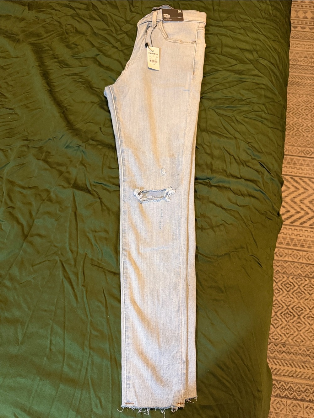 Express Light Wash Skinny Jeans with Knee Rip